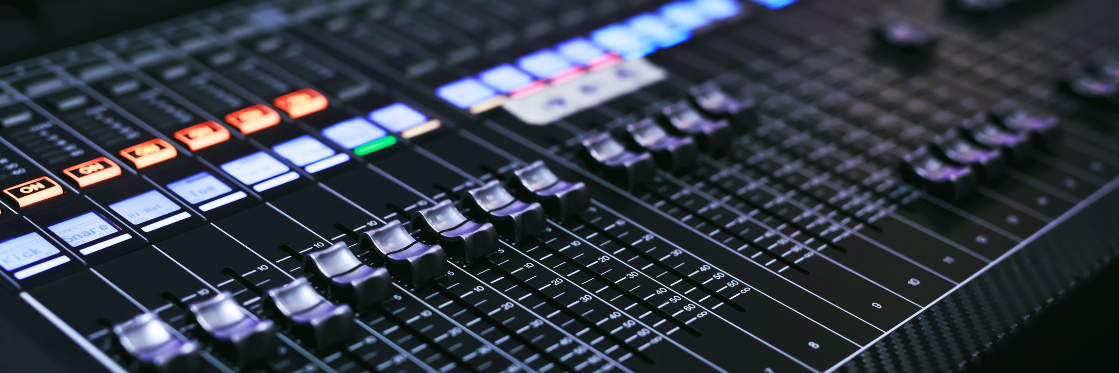 Recording Studio Mixing Desk with Music Producer on the Concert